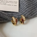 Macro shot of double-hoop earrings featuring burgundy enamel and baguette-cut zircons - Red Enamel Style (A-1165-Red Enamel)