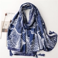 Ethnic style blue beach shawl with white abstract floral prints and tassel details - Blue