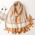 Elegante sciarpa in cotone a fiori con nappe decorative e un morbido stile bohémien - Cachi
