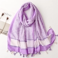 Detail of lavender floral scarf with cotton tassels and bohemian geometric print - Light Purple
