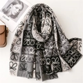 Sciarpa in cashmere a scacchi bianchi e neri con frange morbide e motivi decorativi - Nero e Grigio