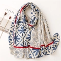 Elegant cotton linen scarf with blue floral prints and red borders on beige background - Blue Grey