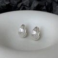 Macro shot of silver water drop earrings featuring brushed texture and star zircon stones - Silver Brushed Star Pattern Earrings (A-1300)