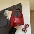 Borsa a bauletto vintage in pelle verniciata rossa con manico e logo a rilievo - Rosso