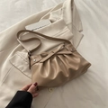 Franse crème geplooide draagtas met strikdetail en sterrenbedel in de kleur beige - Khaki