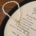 Natural freshwater pearl necklace with gold OT buckle and shell flower tassel pendant - Gold Flower Pendant Style (B-558)