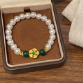 Bracciale di perle fatto a mano con corniola verde e ciondolo a fiore dorato in scatola - Calcedonia Verde (D-154)