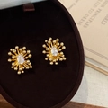Luxurious gold firework zircon stud earrings displayed in a velvet vintage jewelry box - Gold White Zircon