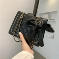 Sac bandoulière noir matelassé avec nœud décoratif et bandoulière chaîne élégant - Noir