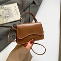 Brown faux leather mini square handbag with curved flap and adjustable crossbody strap - Brown