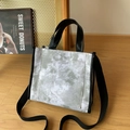 Tie-dye canvas crossbody bag with black faux leather handles and adjustable shoulder strap - Cloud Marble Tie-Dye / Gray