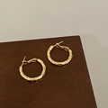 Detail of gold hammered hoop earrings featuring textured surface and secure clasp - Natural Hammered Texture Style (A-1375)