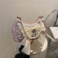 Borsa sottobraccio rosa a pieghe con grande fiocco di raso bianco e manico di perle - Rosa