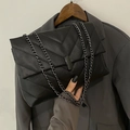 Classic black quilted shoulder bag with V-shaped stitching and a sleek metal chain strap - Black