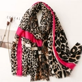 Fashionable leopard print and pink striped scarf with frayed edges on a white background - Rose Pink