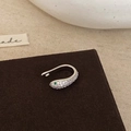 Minimalist silver snake-shaped ear cuff with green gemstone eye and pavé zircon settings - Silver
