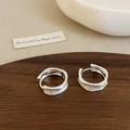 Macro detail of silver irregular wavy textured hoop earrings on a dark wooden tray - Silver Brushed Irregular Earrings (A-1412)