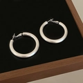 Detail of matte silver spiral double-layer hoop earrings with a secure pin closure - Minimalist Brushed Matte Hoop (A-1358) / Silver