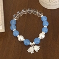 Minimalist light blue natural stone beaded bracelet with white lily of the valley charms - Light Blue Crystal Lily of the Valley Pendant Style (D-248)