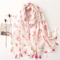 White linen scarf with pink floral prints and fringe tassels on a minimalist background - Pink Floral (SL2205-001)