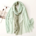 Mint green gradient shawl with silver glitter and fringe on a white minimalist background - Green
