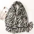 Zebra print lightweight shawl with grey border and fringe tassels on a white background - Black and Gray