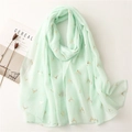 Detail of mint green scarf featuring golden deer prints and soft roll-edge texture - 180*90CM / Mint Green