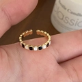 Adjustable gold ring featuring black and white enamel blocks for minimalist fashion - Black and White Enamel Ring