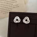 Minimalist silver braided triple hoop earrings with twisted texture on luxury jewelry box - Silver