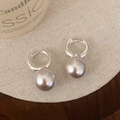 Elegant rose-tinted pearl drop earrings with silver hoops on minimalist linen background - Silver 12mm Manta Rose Pearl Style