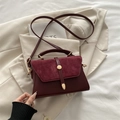 Burgundy suede and faux leather crossbody bag with golden cylindrical magnetic buckle - Burgundy