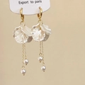 Elegant gold hoop earrings with translucent petals and long pearl tassels on display - White Petal Tassel Style (A-1291)