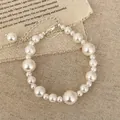 Elegante pulsera de perlas vintage con perlas blancas y cadena ajustable de plata mujer - Pulsera de perlas blancas / Blanco