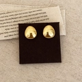 Orecchini a goccia d'oro minimalisti con finitura lucida a specchio su tessuto vintage - Piccolo Lucido / Oro