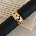 Macro view of gold brushed wide band ring with sparkling star-set zirconias - Wide Version / Gold Wide Band Ring