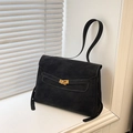 Borsa a tracolla nera opaca minimalista con chiusura dorata vicino alla finestra - Nero