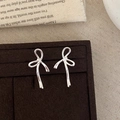 Elegant silver ribbon bow stud earrings in a vintage jewelry box for daily wear - Silver Bow Ribbon Stud Earrings (A-39)