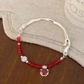 Lussuoso bracciale di perle e cristalli con zirconi rossi ed elementi in metallo argento - Stile Sfera Shamballa in Cristallo Rosso Zircone Rosso