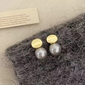 Detail of elegant gold disc earrings featuring large smokey grey pearl pendants - Gold Mirror Grey Pearl