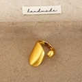Asymmetric gold open ring with brushed matte finish and polished bead on earthy textures - Adjustable Open / Gold Brushed Style