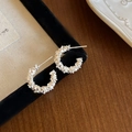Detailed macro view of silver irregular textured C-shaped hoop earrings on black velvet - 1.7cm/3.00g / Silver (1.7cm)
