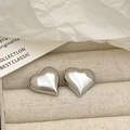 Detailed macro view of polished silver heart stud earrings inside a gift box - Heart Stud Earrings (A-359)