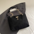 Chic black frosted suede tote bag featuring a golden chain strap and deer pendant - Black