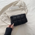 Black quilted puffer cosmetic bag with checkered texture and durable zipper closure - Black