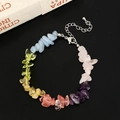 Macro shot of colorful natural stone fragment bracelet with silver lobster clasp and chain - Colorful Natural Chip Stone Bracelet