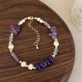 Detail of amethyst and pearl beaded necklace with gold lobster clasp on wood tray - Purple Crystal Freshwater Pearl Bracelet