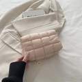 Soft quilted light pink cosmetic bag with square embossed padding and zipper - Pink