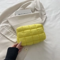 Bright yellow quilted makeup bag in a stylish checkered design with soft puffer texture - Yellow