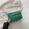 Quilted green cosmetic pouch in soft puffy fabric with square patterns and zipper closure - Green
