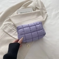 Light purple quilted puffer pouch with a stylish square pattern and soft fabric texture - Purple